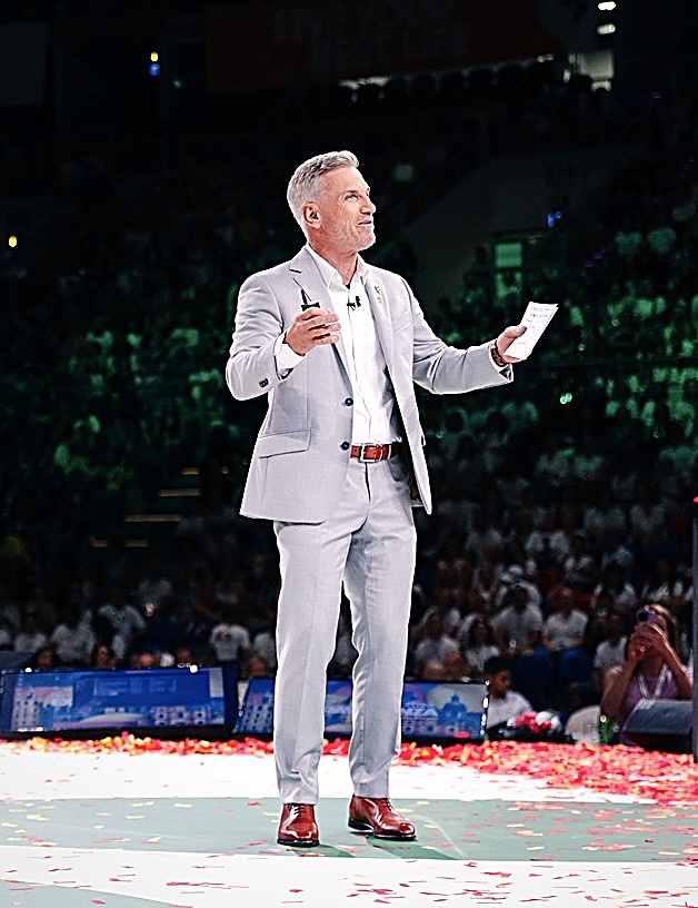 Michael Burton on stage at a live event